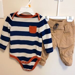 Long sleeved onsie and khaki pants